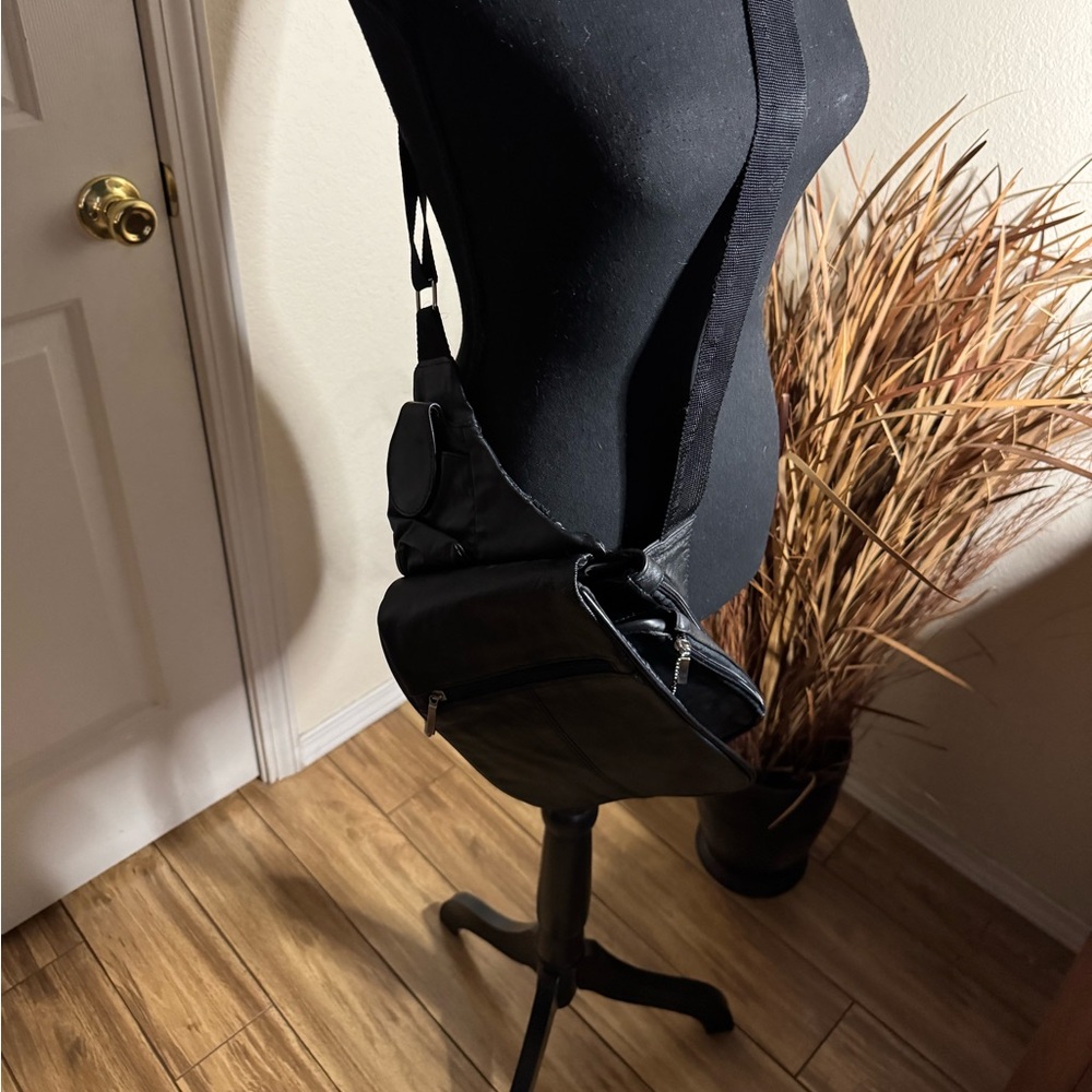 Covington brand women's sling bag in black